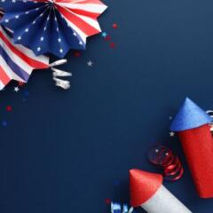 US Federal holidays greeting card template with paper fans and firework rockets on dark blue background