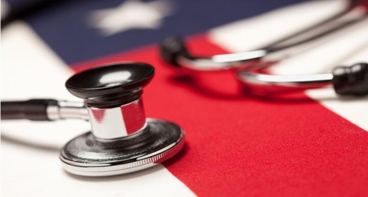 Stethoscope lying on top of American flag