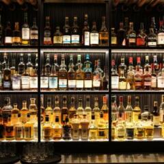 various whisky bottoles on shelves