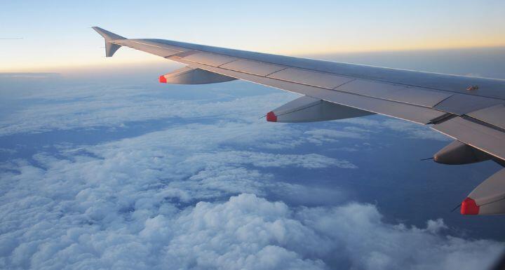 Wings above the clouds