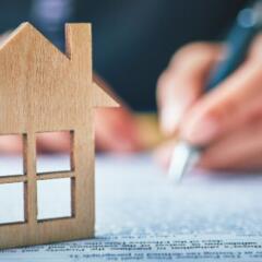 Wooden House Icon sitting on Contract