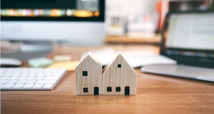 Wooden house model with workplace table