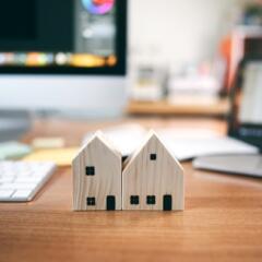 Wooden house model with workplace table