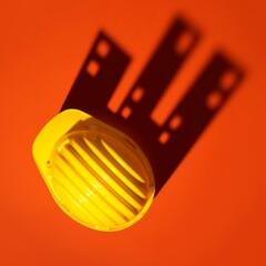 Work safety helmet casting a shadow of buildings