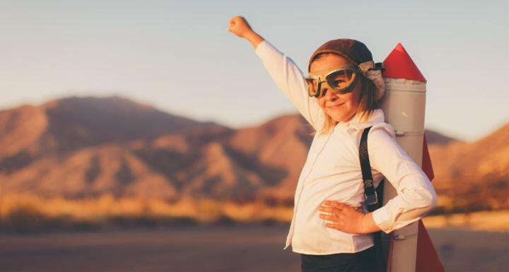 Young Business Girl with Rocket Pack