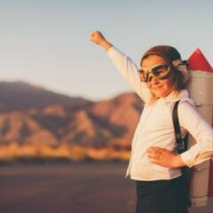 Young Business Girl with Rocket Pack