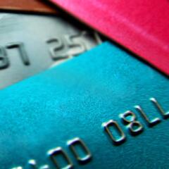 a colorful collection of credit cards in a pile