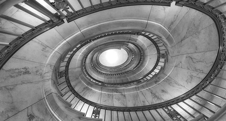 Looking up from the center of the spiral stair case of the Supreme Court steps