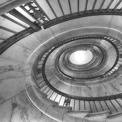 Looking up from the center of the spiral stair case of the Supreme Court steps