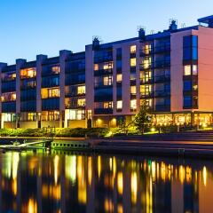 Modern apartment building overlooking a lake