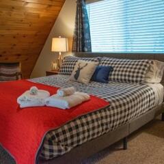 made up bed at bed and breakfast