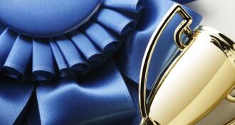 Trophy with a blue ribbon