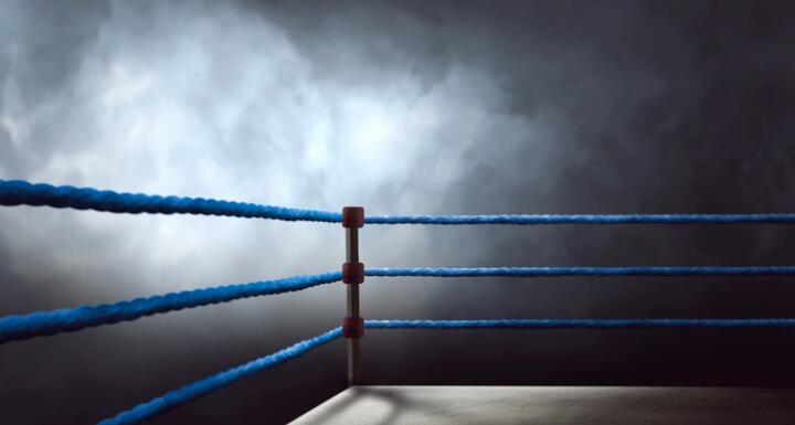 boxing ring surrounded by blue ropes