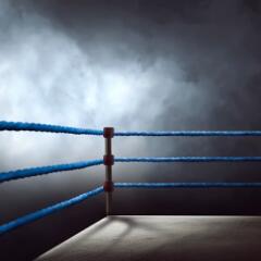 boxing ring surrounded by blue ropes