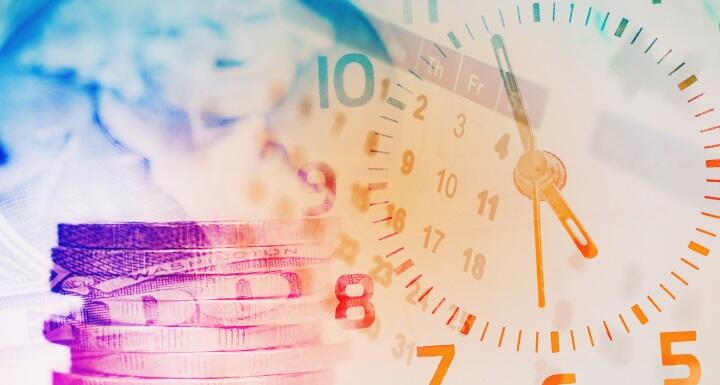 Double exposure of calendar, paper money, and stack of coins