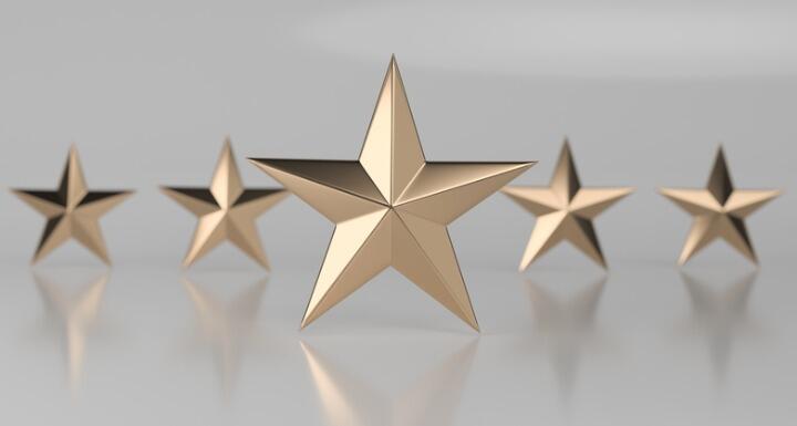 Five gold stars on a gray background