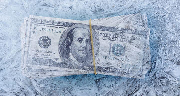 frozen dollars in ice cube