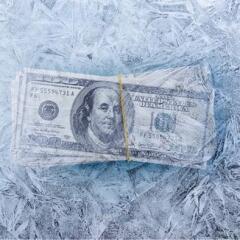 frozen dollars in ice cube