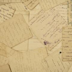 a collection of old letters on yellowed paper