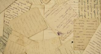 a collection of old letters on yellowed paper