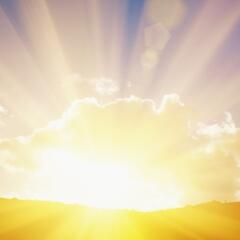 sun's rays on the horizon flare