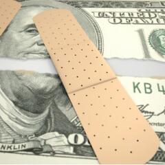 torn money bandaid