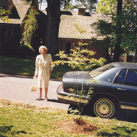 Ernestine Williams in front of her home.