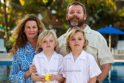 Fin and Nancy Gaddy with twin sons Charles (left) and Brown. (Photo by Scott Kerrigan of Aqua Paparazzi and used with permission.)