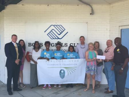 L-R: Stuart O'Neal, BHCF board member; Theresa Gilmore, Boys & Girls Club of Coastal Plains; Nicole Howard, BHCF board member; Boys & Girls Club Junior Leaders; Read Allen, BHCF board member; Beth Wilder, BHCF board chair; Marcy Morgan, BHCF board member; Bill Rich, BHCF board member; and Darnell Williams, Boys & Girls Club.