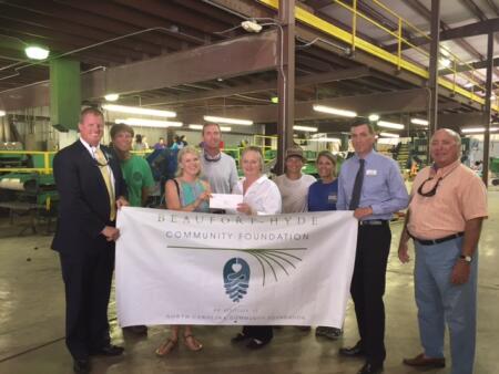 L-R: Stuart O'Neal, BHCF board member; Hunter Gibbs, Pamlico Shores; Beth Wilder, BHCF board chair; Read Allen, BHCF board member; Carolyn Anderson, Food Bank of the Albemarle; Bethany Pugh, BHCF board member; Rod Shearin, Food Bank of the Albemarle; and Bill Rich, BHCF board member.