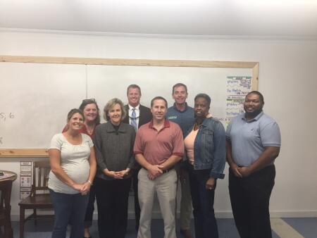 Pictured are Beaufort-Hyde Community Foundation board members Bethany Pugh, Buffy Johnson, Marcy Morgan, Stuart O’Neal, Chip Edwards, Read Allen, Tuyet Moore and Lee Brimmage.