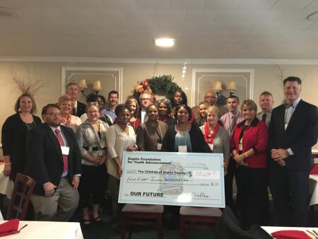 Duplin Foundation for Youth Advancement board members, grantee representatives and community leaders pose for a photo following this year’s grants reception with the ceremonial awards check representing local 2016 grants from the Foundation for Youth Advancement.