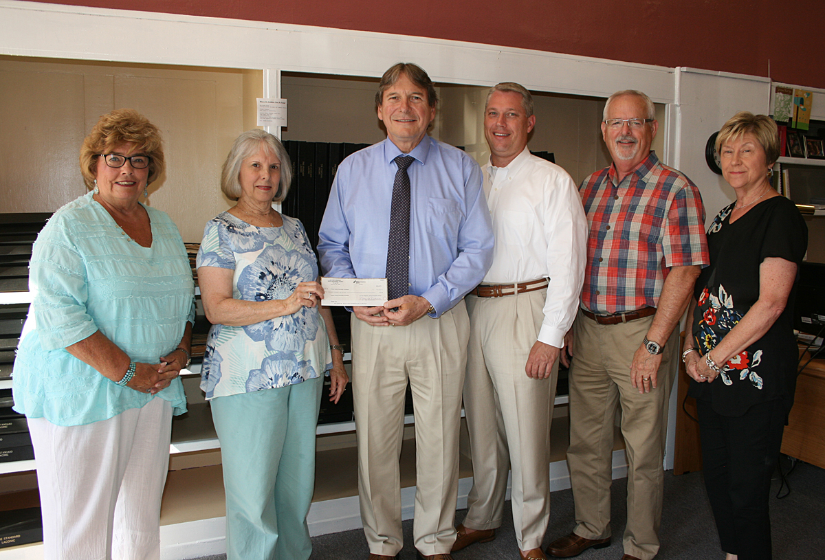 (From left to right) Judy Davenport (Greene County Community Foundation board member and co-coordinator of the Garden Walk), Rhonda Hughes ("Forever Young Circle" and Garden Walk co-coordinator) present Michael Rhodes (GCCF president), Jody Tyson, Rick Davis and Randy Davis (GCCF board members) with check.