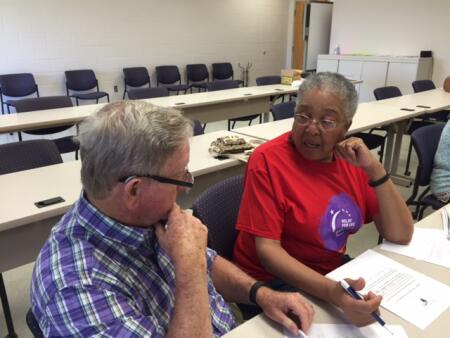 Elwood Morris (left) and Elois Body (right) discussing storytelling strategies.