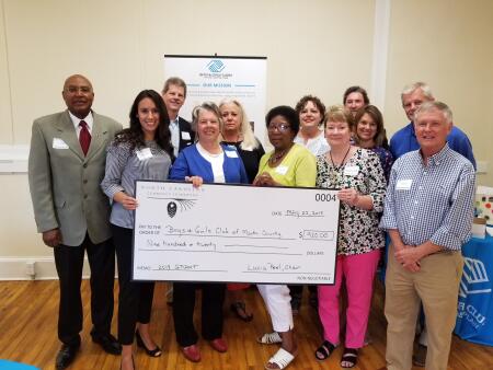 Representatives from the Boys & Girls Club of the Coastal Plain accept the 2018 grant award from the board of advisors of the Martin County Community Foundation.