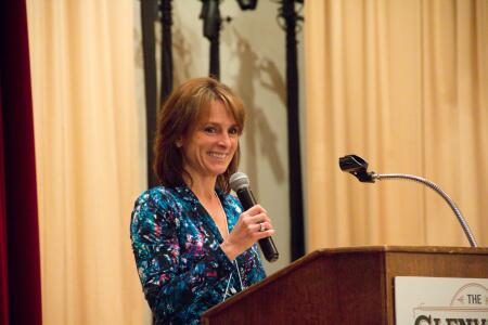 Incoming Network President Laurie Hughes addresses the reception attendees.