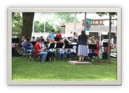 Students playing instruments provided with Brown's support.