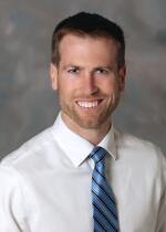 Schneider MD, Brian J.