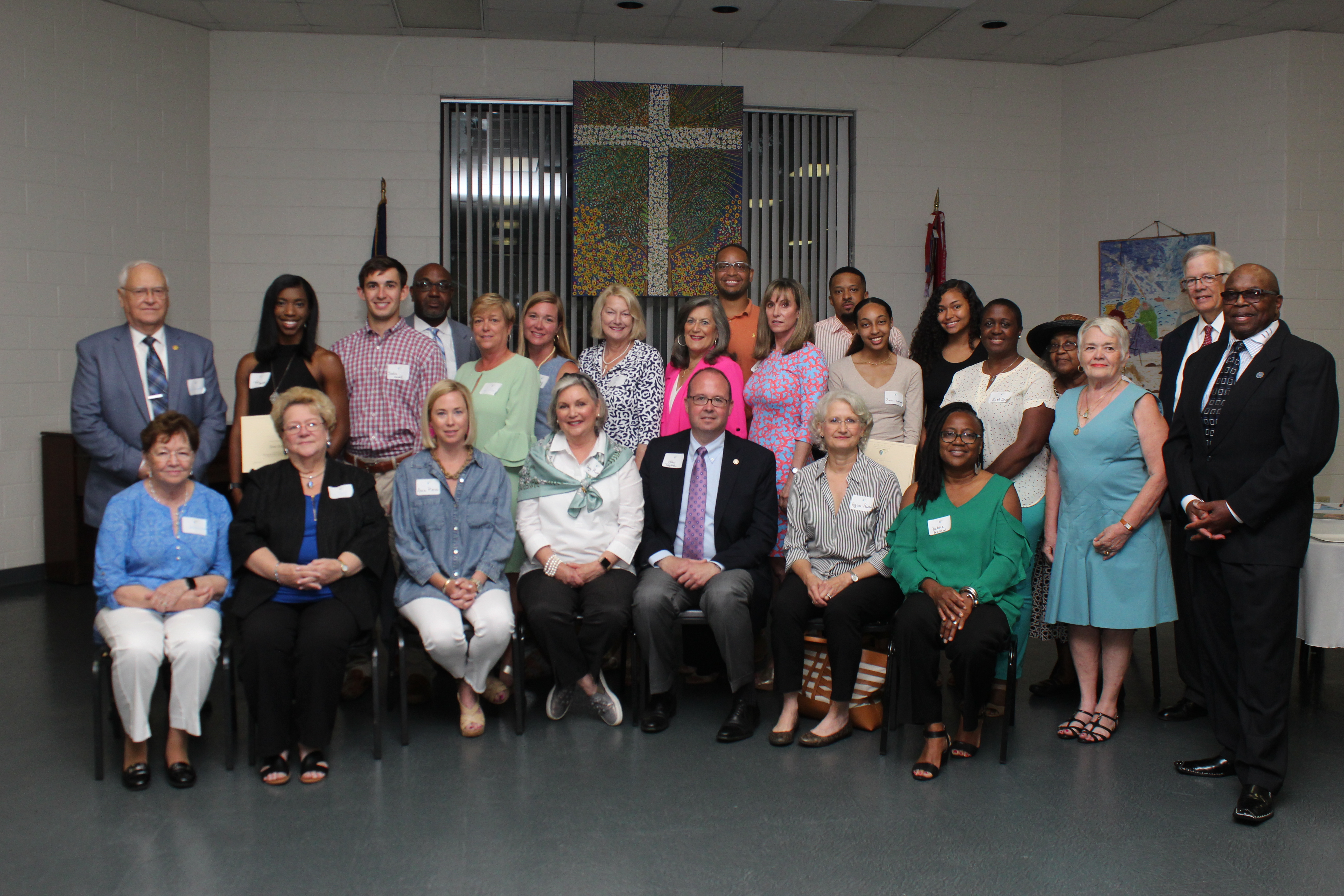 Members of the board of advisors of the Bertie-Hertford Community Foundation with local grants and scholarships recipients at the annual awards ceremony.