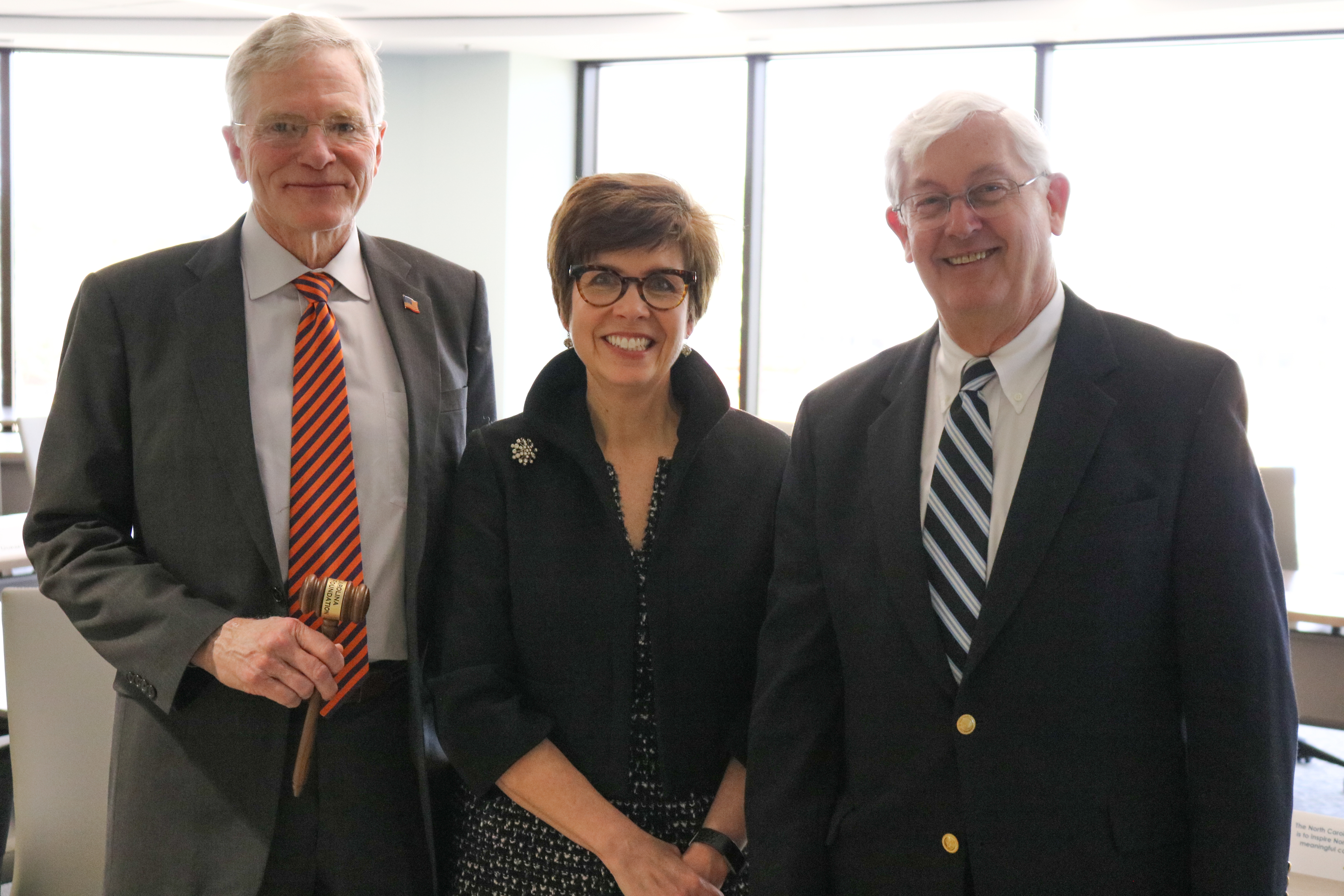 NCCF CEO Jennifer Tolle Whiteside (center) is pictured with Board Chair Rodney Earl Martin (left) and Jim Black, former chair and outgoing board member.