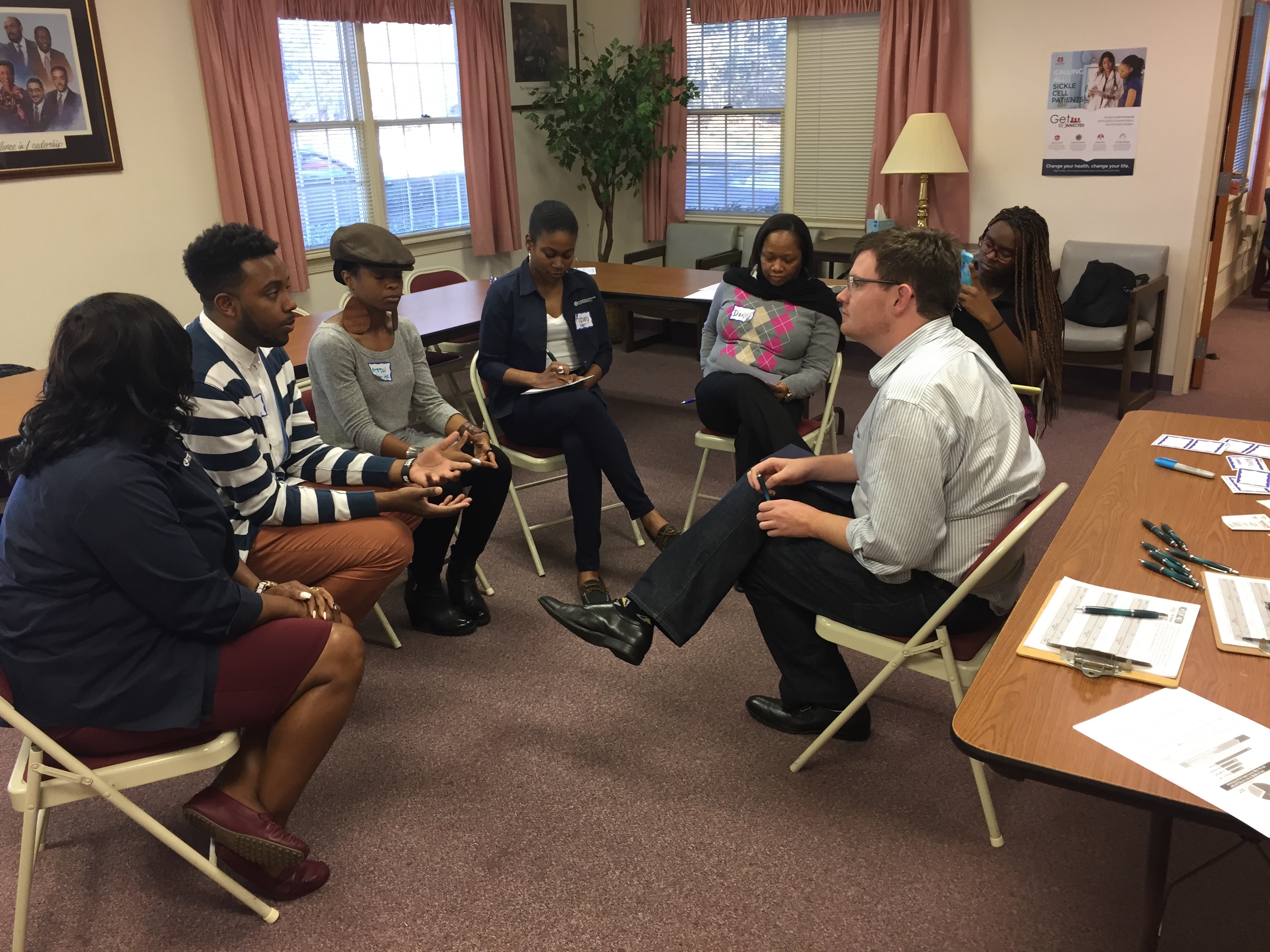 Pictured is Lee Storrow, executive director of the NC AIDS Action Network, meeting with community leaders and advocates. His organization created their first endowment with NCCF in 2019 and has already successfully grown the fund to support their work for years to come.