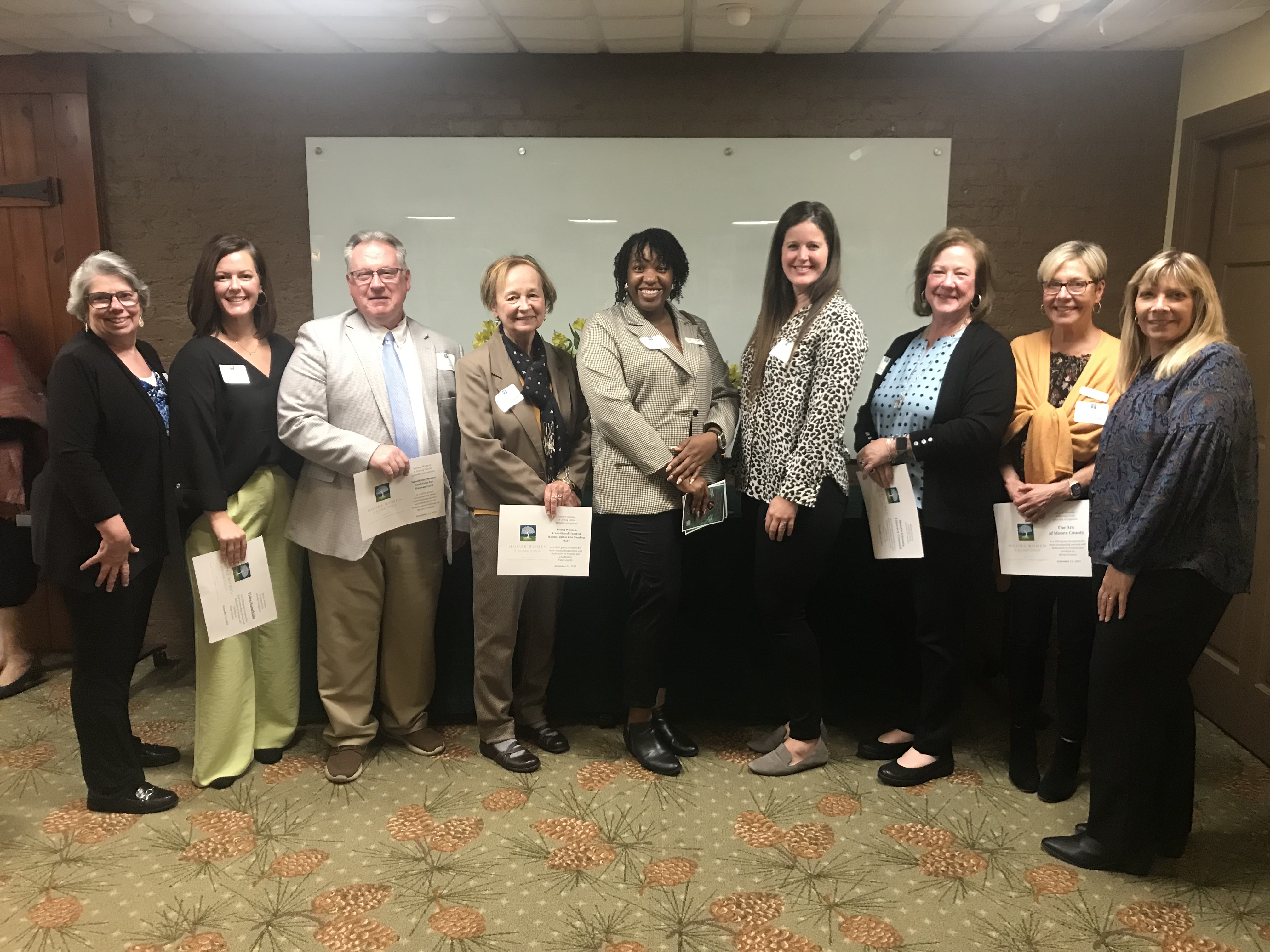 Representatives of the nonprofits attended a gathering with giving circle members. Pictured from left, Peggy Hendrix, Family Promise of Moore County, Julia Johnstone, Tides Sandhills, Stephen Phillips, Sandhills/Moore Coalition for Human Care, Dr. Christine Ganis, Tambra Place, Danielle Rose and Diane Atherton, Partners for Children and Families, Joyce Clevenger, C.A.R.E Group, Wendy Carter, The Arc of Moore County, and Kimberly Ledford, Friend to Friend.