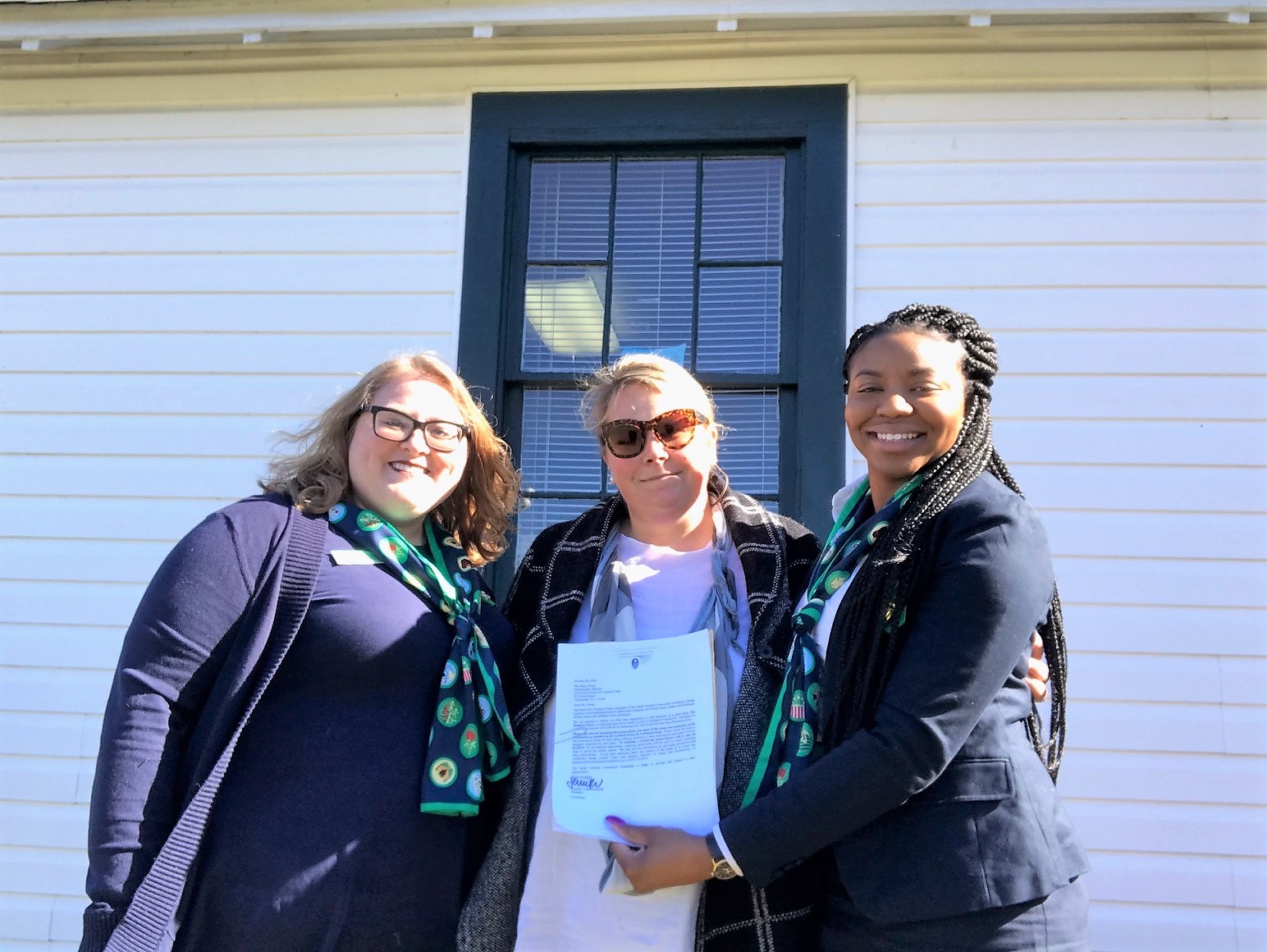 The Women’s Fund of North Carolina awarded a grant to the Girl Scouts Council of Colonial Coast this year. Pictured accepting the grant are Jessica Woodyard (left) and Tameika Hopkins with NCCF Regional Director Natalie Peel.