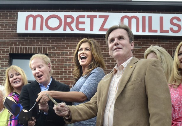 Marilyn and John Moretz, and Kathy Ireland along with Hank Guess, cut the ribbon at the Moretz Mills' grand opening Friday afternoon.  (Image: Robert C. Reed)